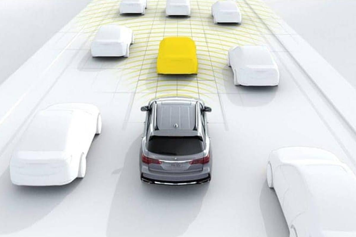 Car with adaptive cruise control on highway